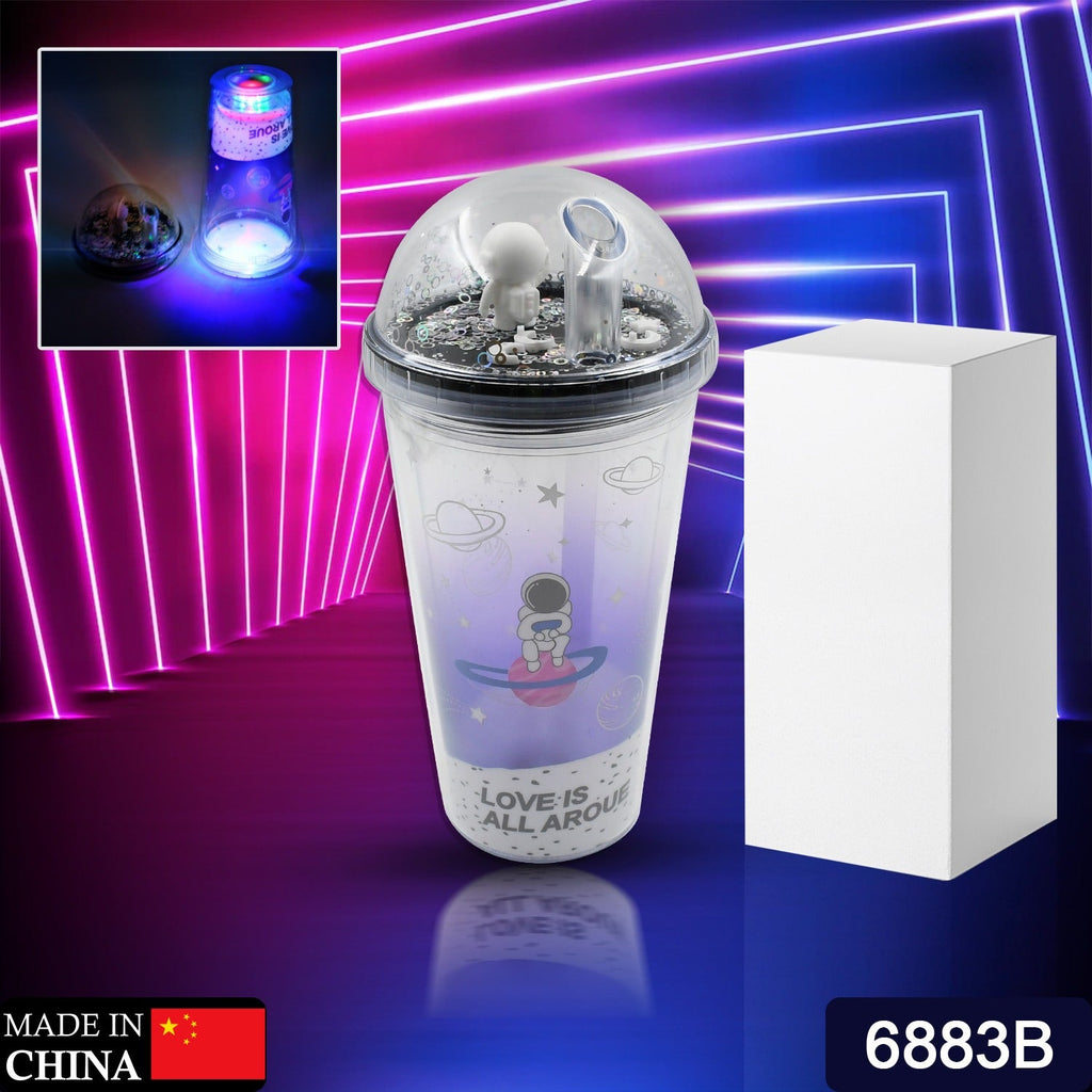 Close-up of the insulated astronaut tumbler, highlighting the detailed space design and LED light.