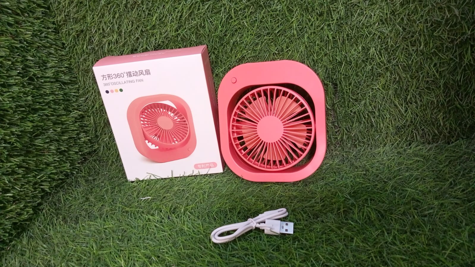 Compact USB fan in a travel scenario, fitting neatly into a small space.