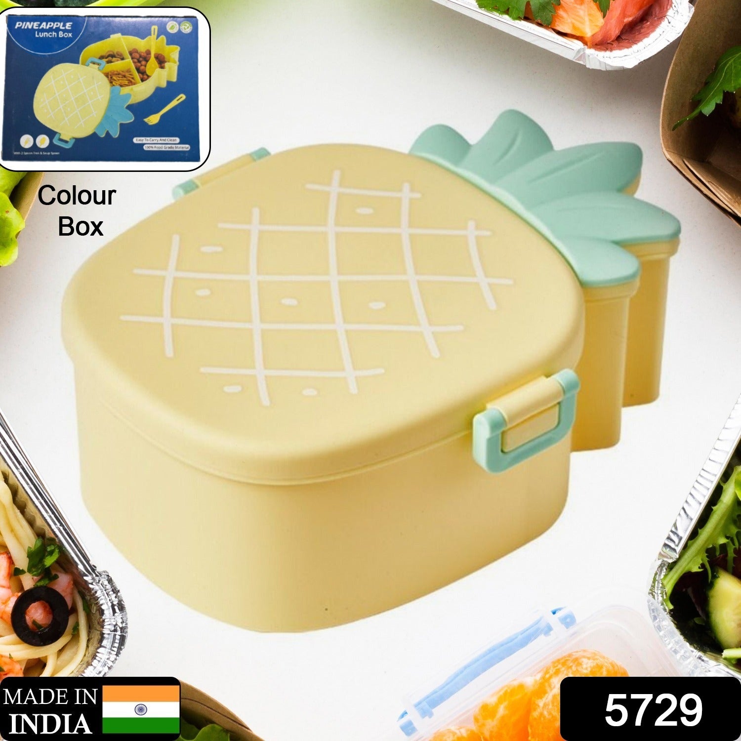 Close-up textured view of the bright yellow pineapple lunchbox lid.