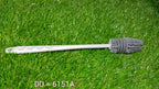 A bottle cleaning brush shown cleaning a narrow-necked bottle with ease.