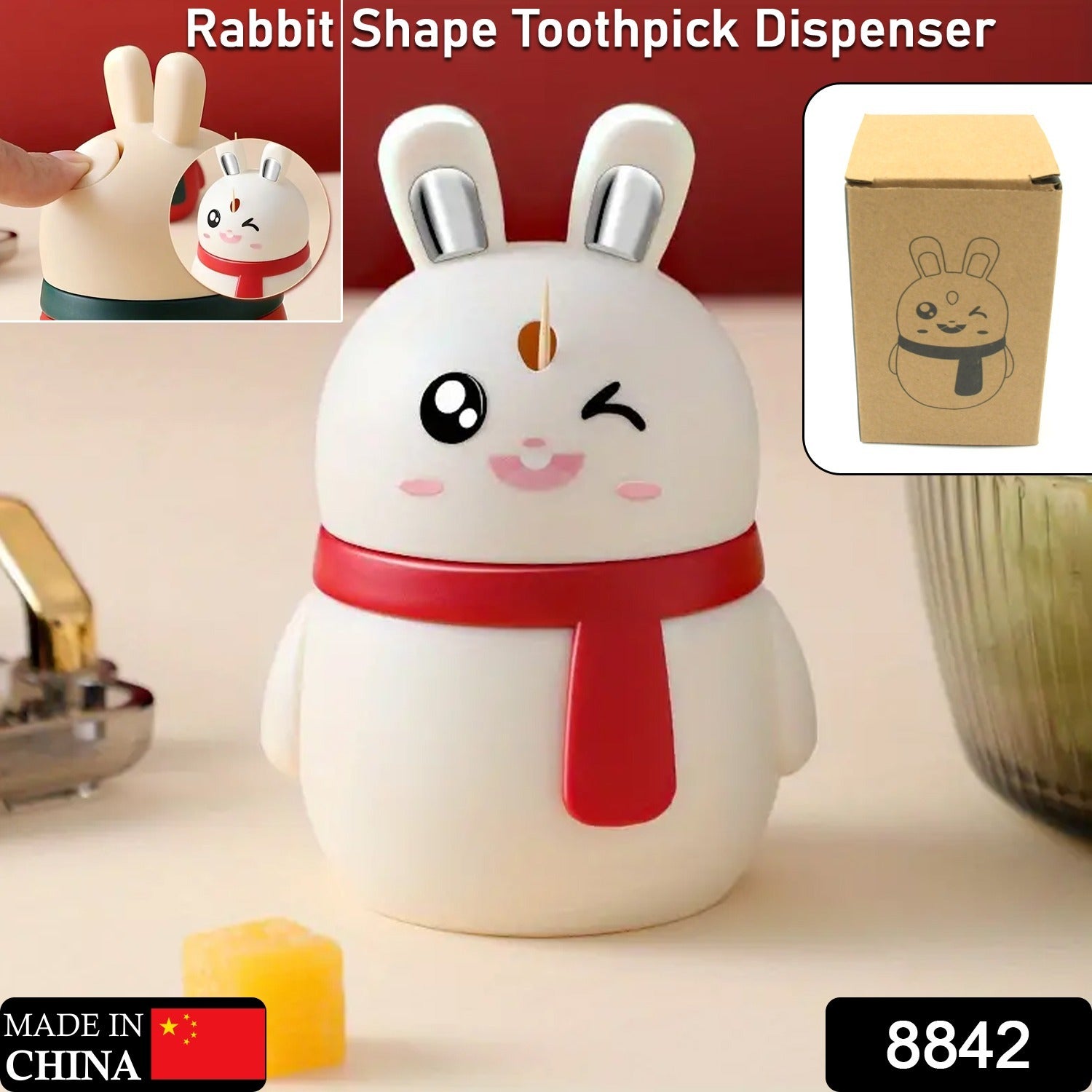 Close-up of the cute rabbit face on the red toothpick dispenser, highlighting its smiling expression.