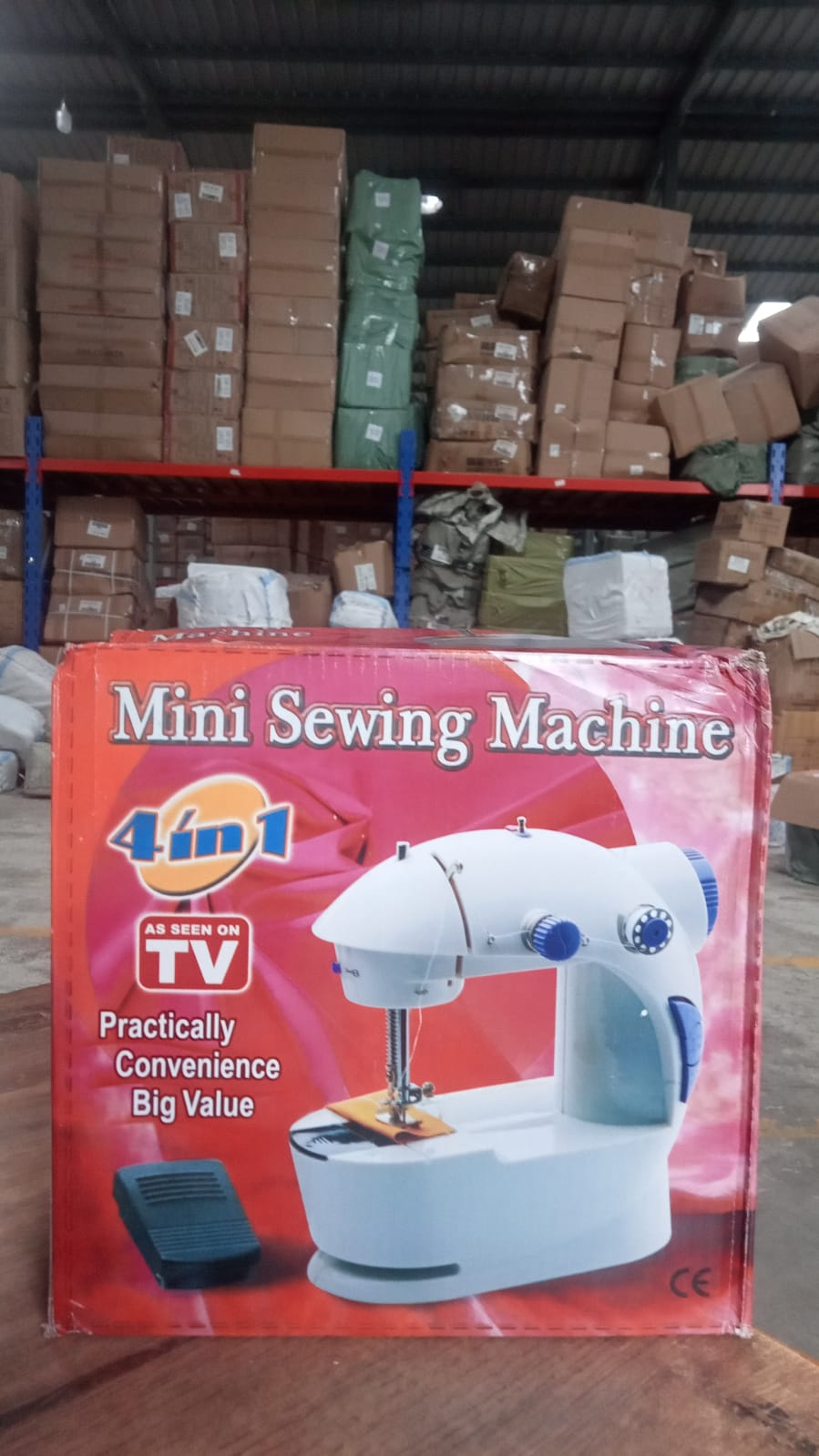 Image showcasing the XcelCraft mini sewing machine's easy bobbin rewinding feature.