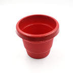 Versatile 13cm plastic pot with removable drain plug, ideal for various plants.