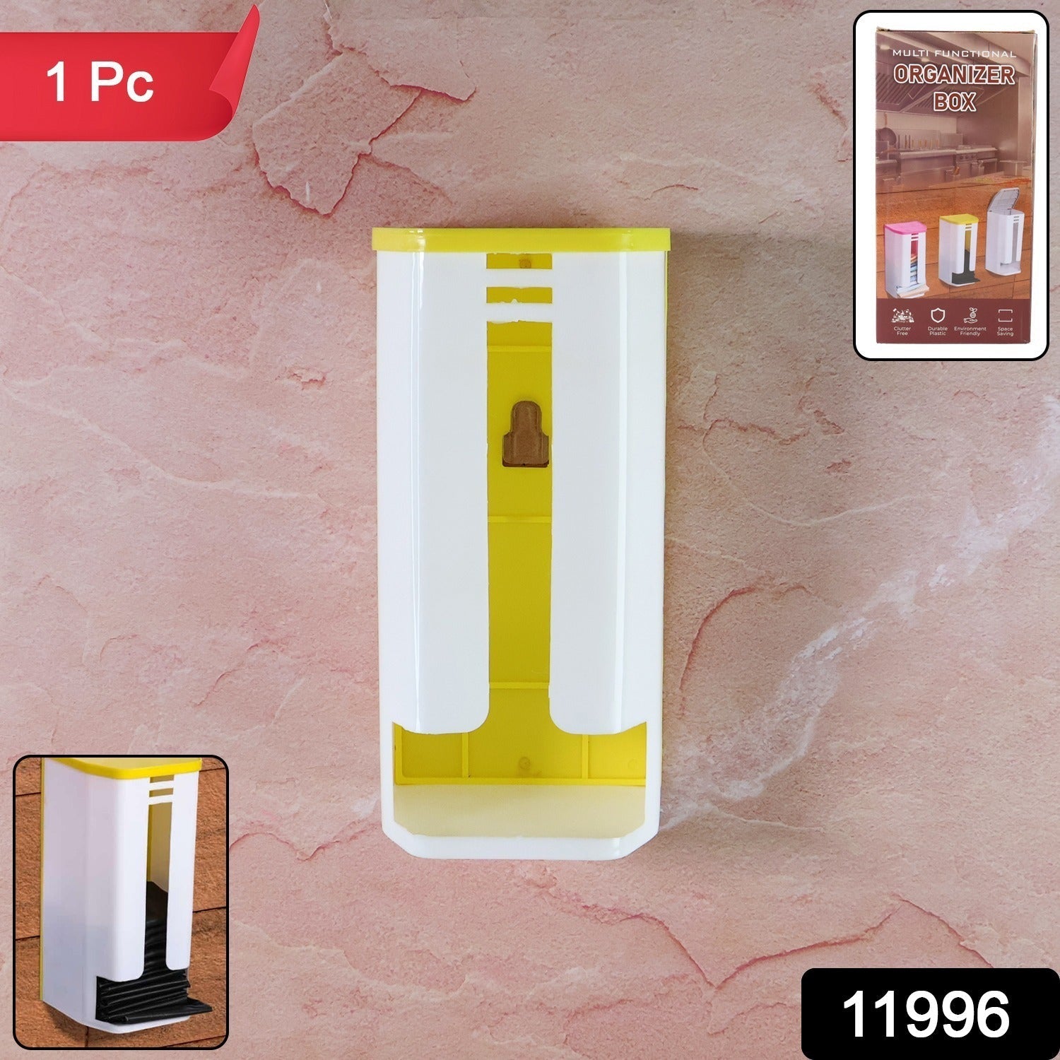 Compact plastic bag organizer box mounted on a kitchen wall, saving space.