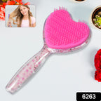Ergonomic heart-shaped detangling brush in a vibrant color, ideal for all hair types.