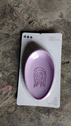 Top-down view of the compact plastic soap dish, highlighting its clean lines and functionality.