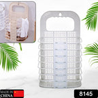 Collapsible laundry hamper with clothes hanger and storage hook for kids' clothes.