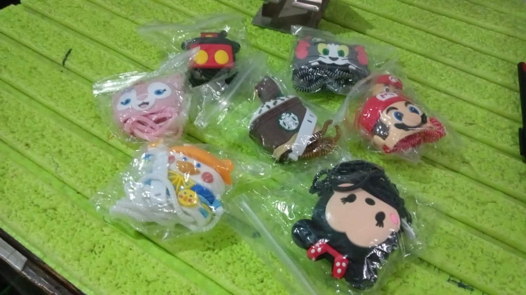 Another angle of the durable cartoon charger cover in silicon material.
