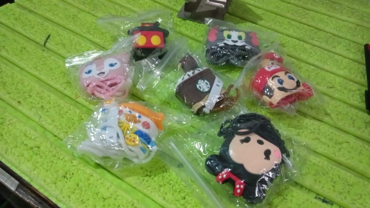 Another angle of the durable cartoon charger cover in silicon material.