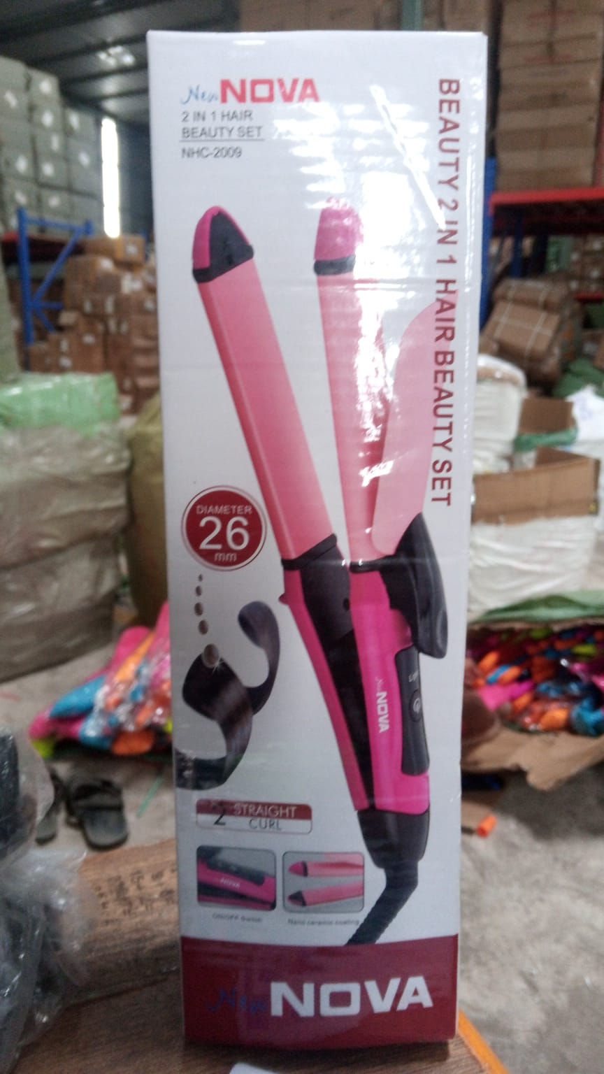 Packaging of the dual function hair straightener and curler.