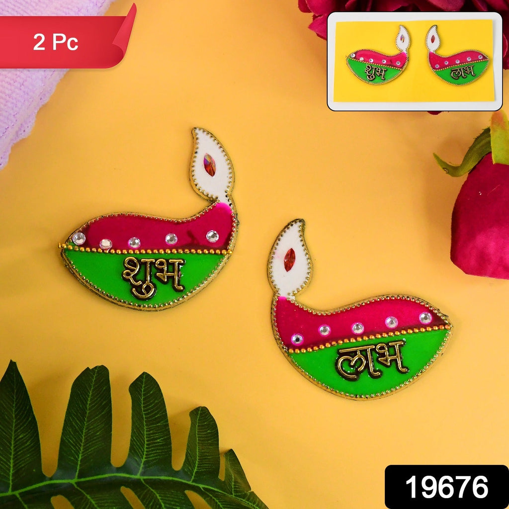 Decorative Shubh Labh diyas hanging on wall, ideal for traditional home décor