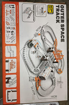 Components of the Space Race Track Set laid out for assembly.