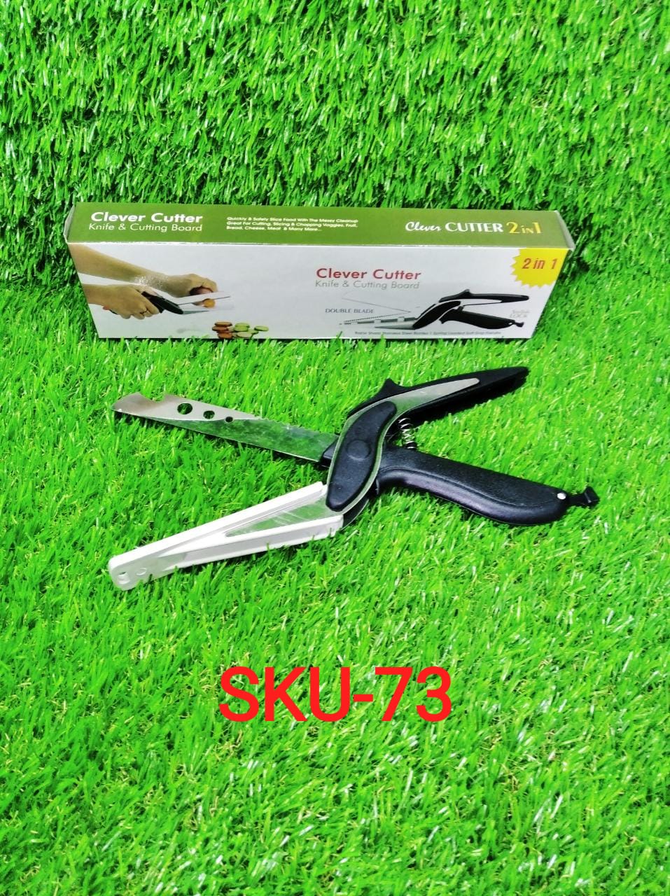 Versatile clever cutter in black, highlighting its food-grade stainless steel construction.