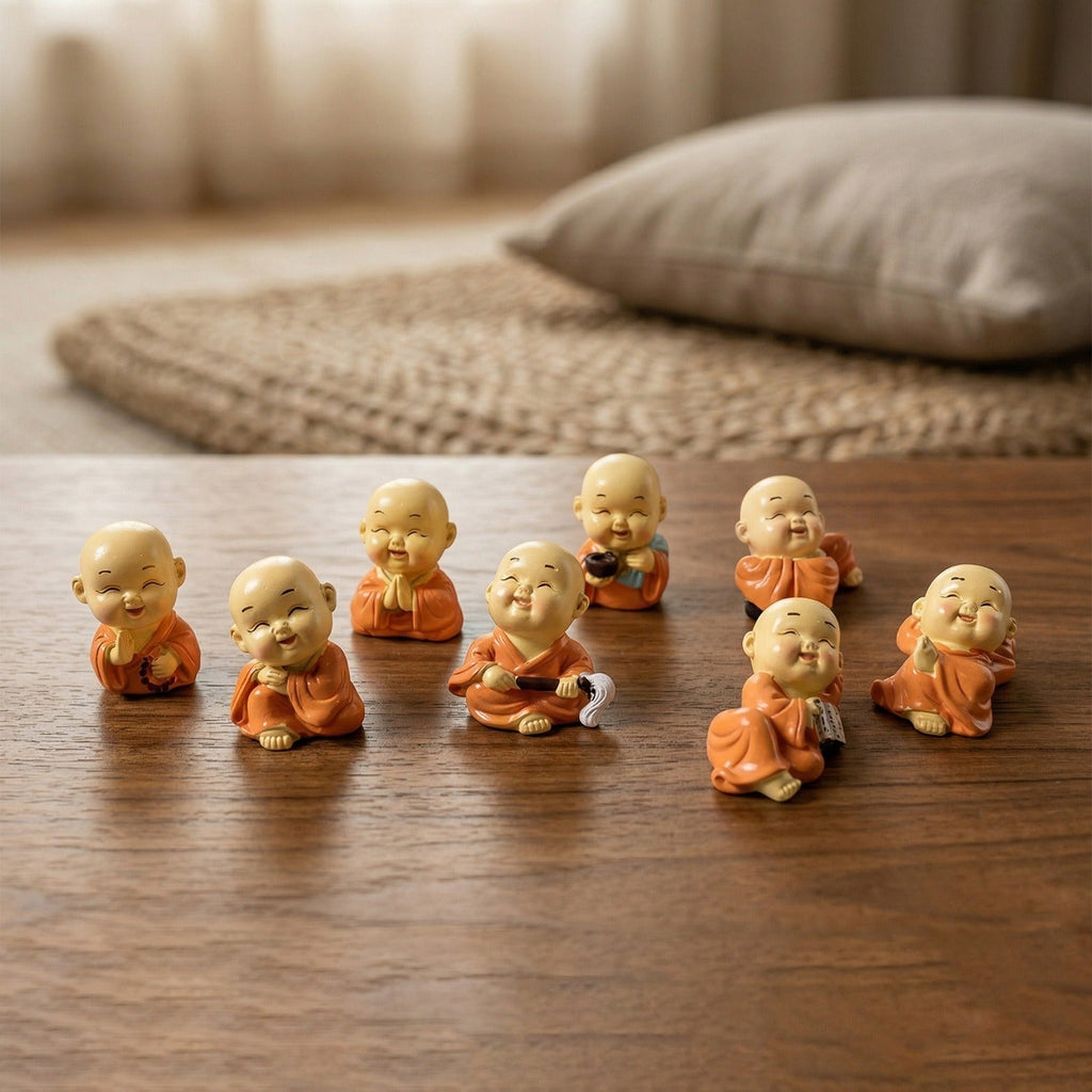 Variety of Mini Monk Buddha figurines in different poses for spiritual ambiance