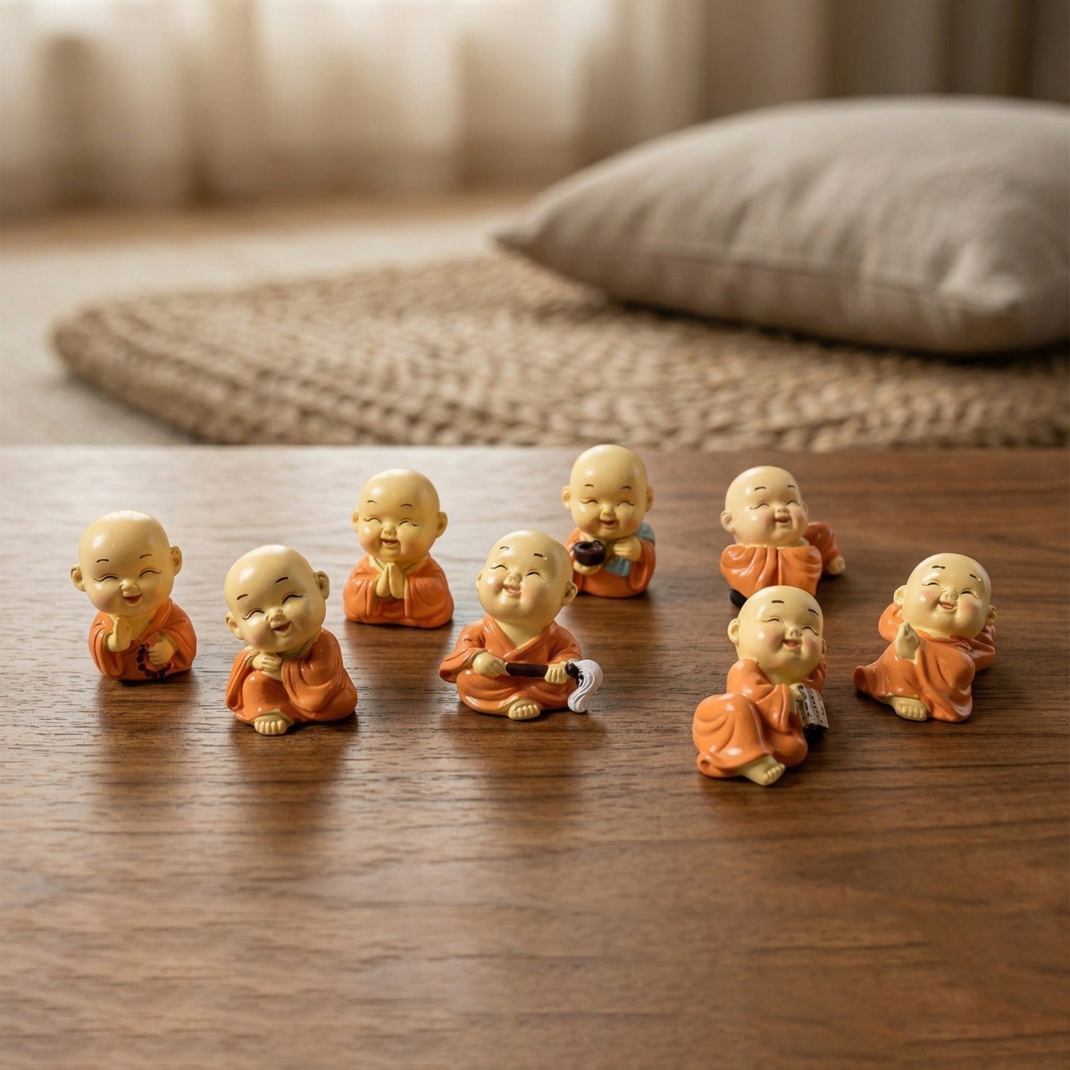 Variety of Mini Monk Buddha figurines in different poses for spiritual ambiance