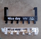 Heavy-duty 6-hook over door hook rack with panda design shown in its packaging.