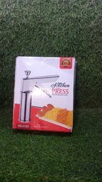 Stainless steel kitchen press displayed with all 15 attachments for various snacks.
