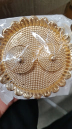 Traditional round Puja Thali presented as a thoughtful gift for special occasions.