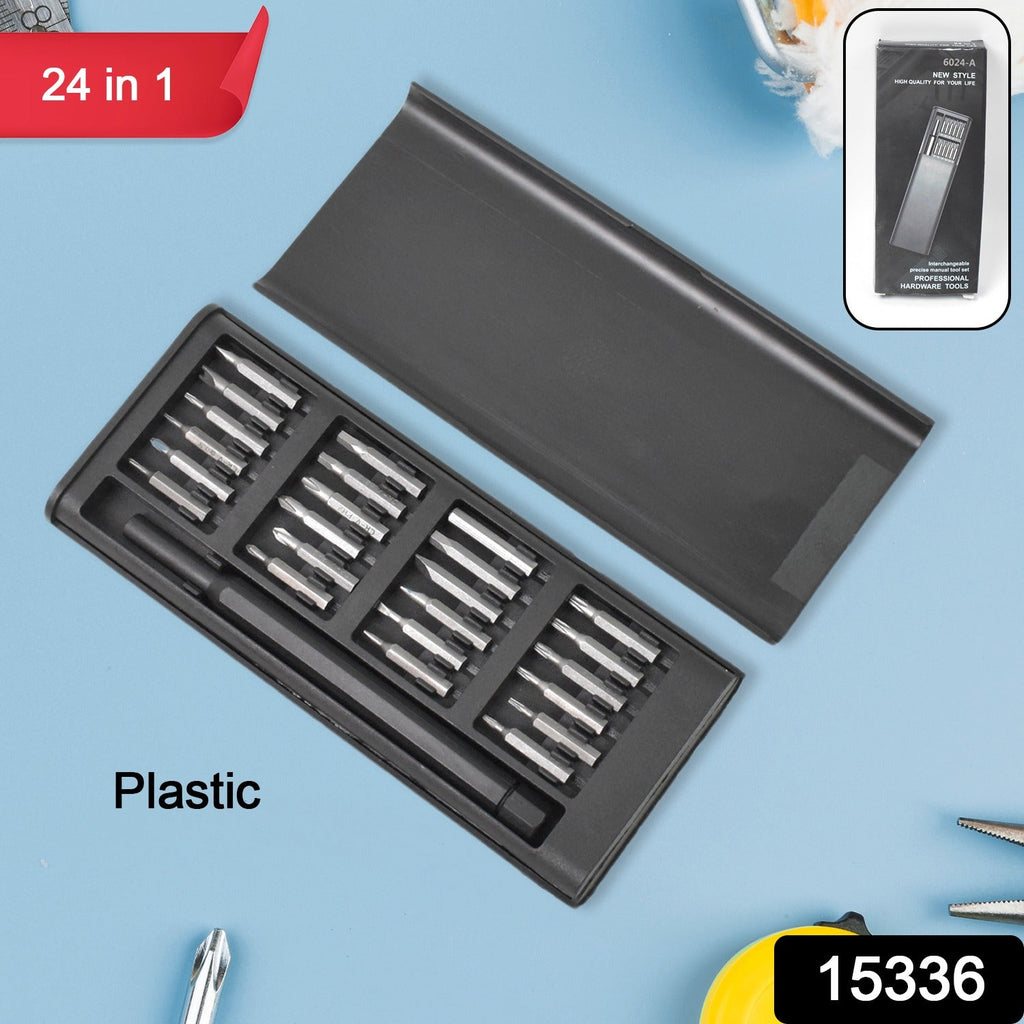 Close-up of 24 precision screwdriver bits laid out with the magnetic handle for electronics repair.