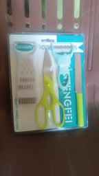 Kitchen cutting set tools displayed on a white kitchen counter