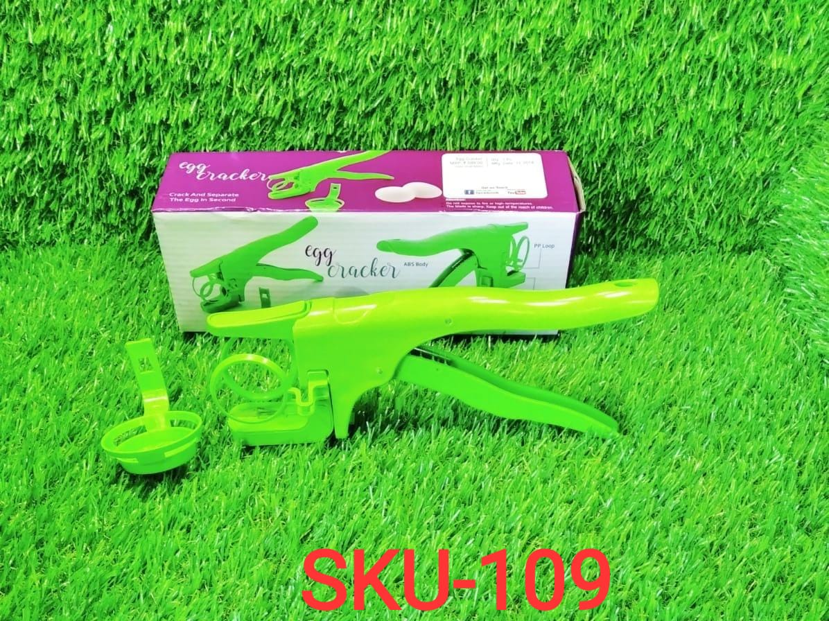 The handy plastic egg cracker with separator resting on a clean kitchen counter, ready for use.