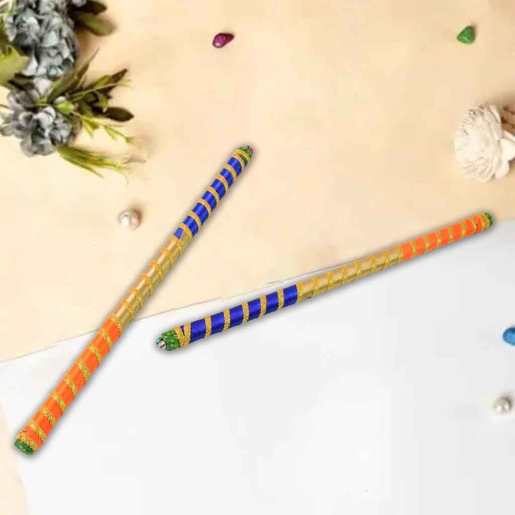Pair of decorative dandiya sticks featuring vibrant traditional design for festivals