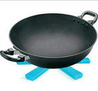 Portable foldable hotmat protecting a dining table from a serving dish.