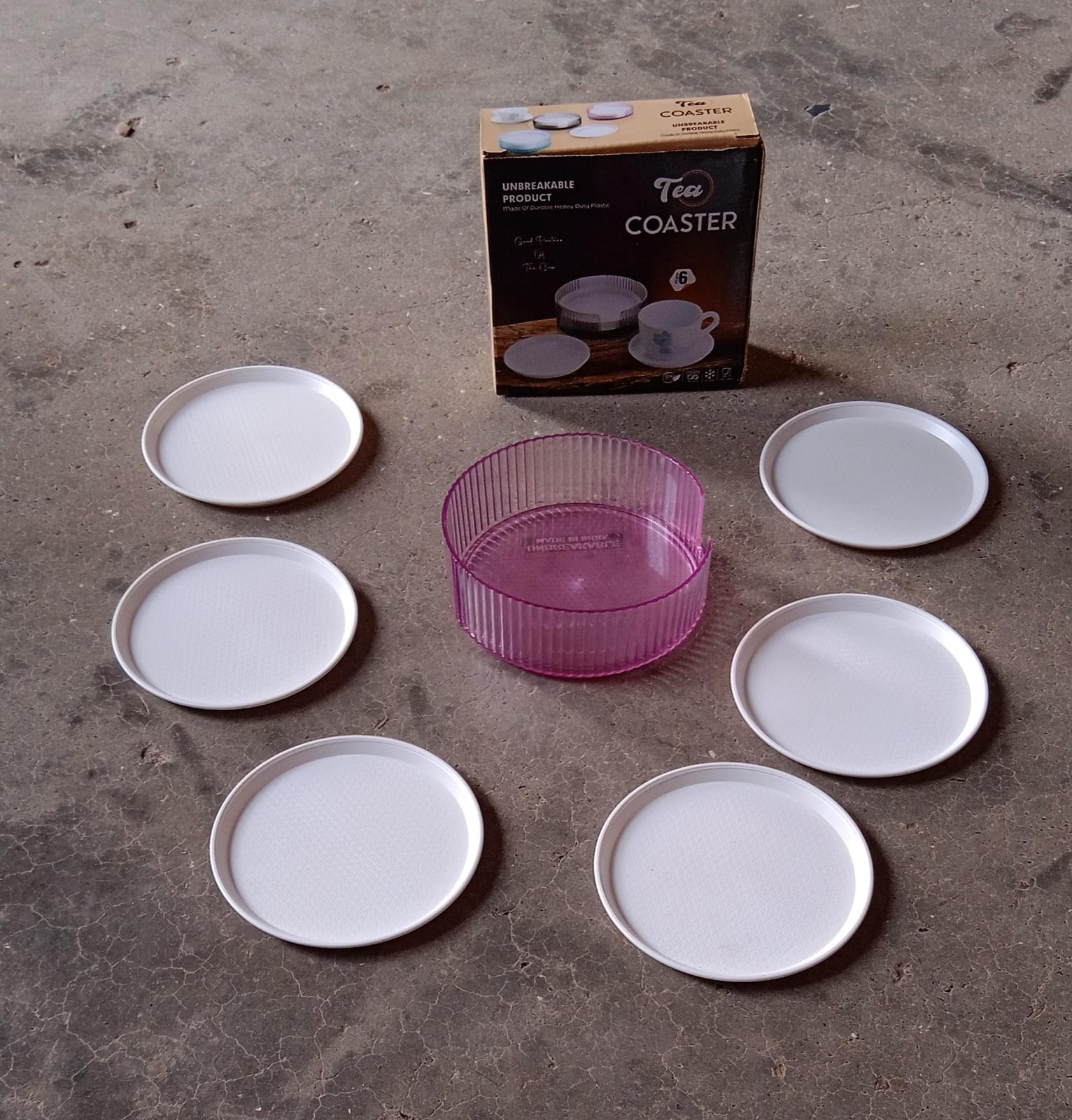 Plastic coasters effectively safeguarding furniture from hot beverage marks and spills.