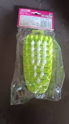 Plastic cleaning brush for fruits and vegetables in kitchen