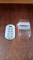 Soap box displayed on a counter showing its compact design