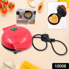 Mini Waffle Maker with open lid and freshly cooked waffle inside