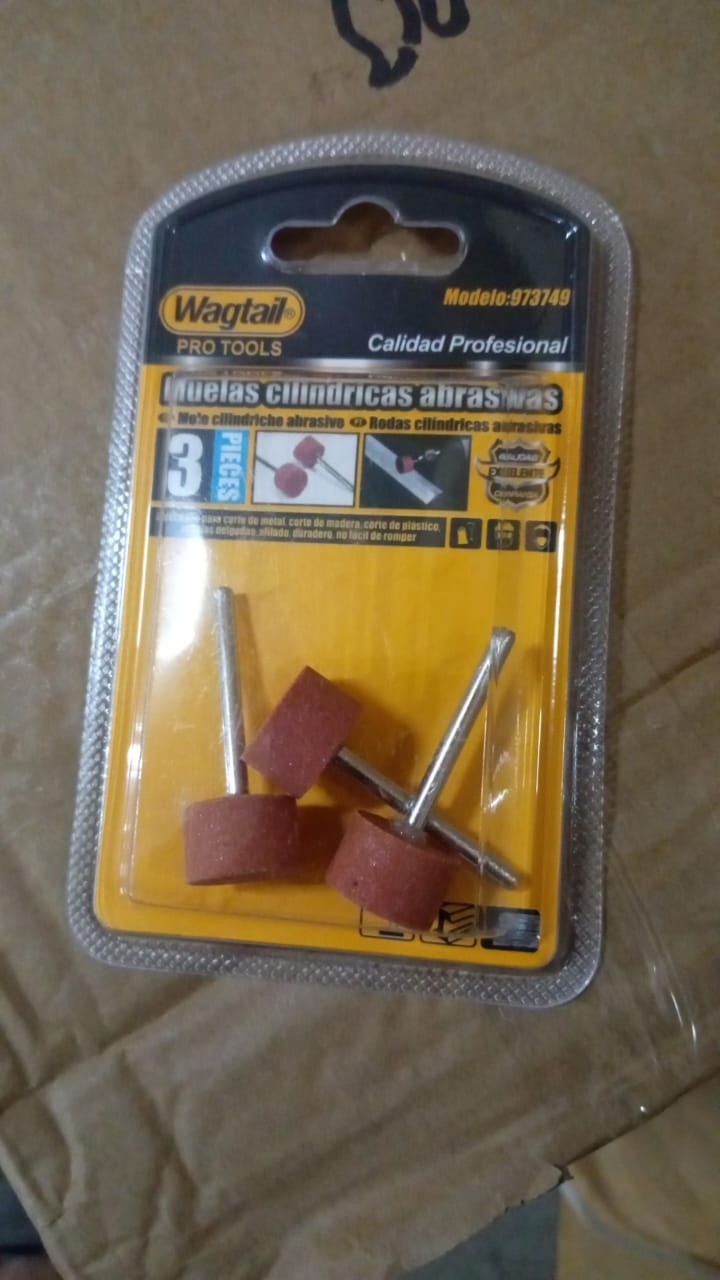 Demonstration of the polishing wheels in use on a metal surface.