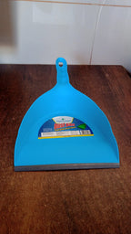 Angled view of the grey plastic dustpan, ready for daily cleaning tasks.