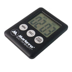Magnetic countdown timer securely attached to a refrigerator door.