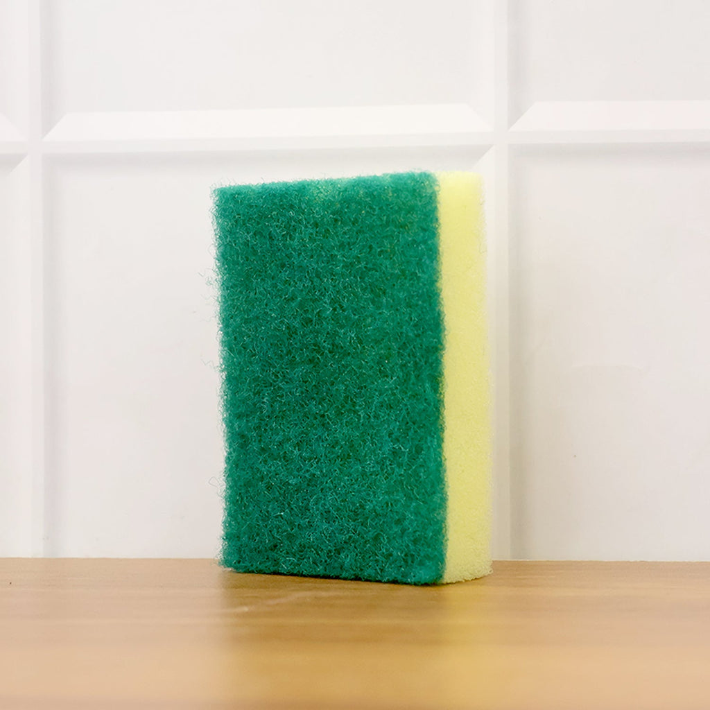 Versatile scrub sponge being used for general household surface cleaning.