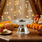 Traditional festive stainless steel diya holder for pooja rituals