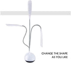 Adjustable portable LED reading light demonstrating flexible neck.