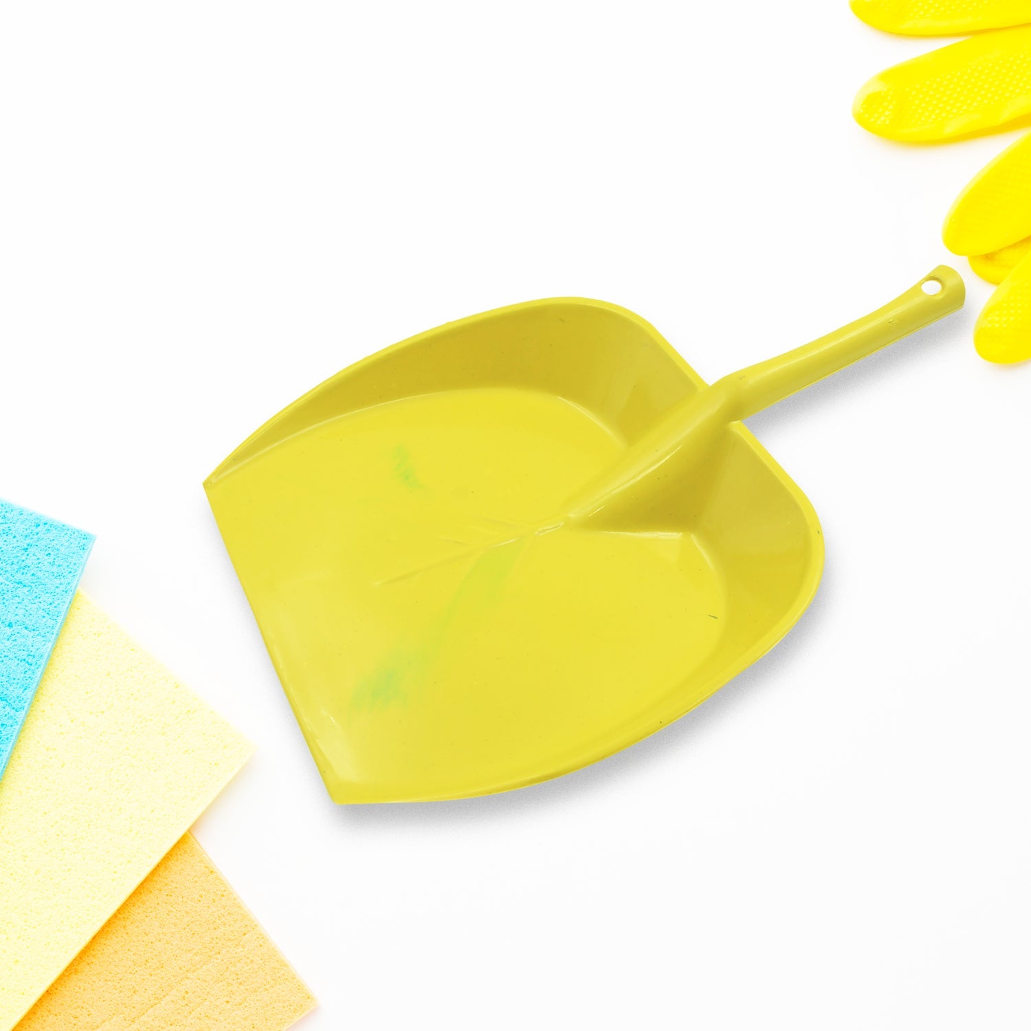 Storenzo long handle dustpan standing upright, ready for use.