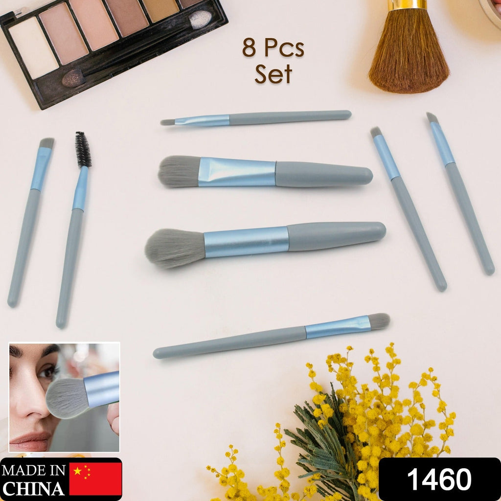 A variety of makeup brushes from the 8-piece mini makeup brush set displayed with colorful handles.