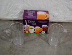 Clear plastic handled tumblers arranged for a picnic, highlighting their outdoor suitability.