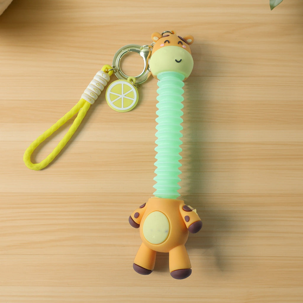 Cute giraffe cartoon keychain featuring flexible neck and strap