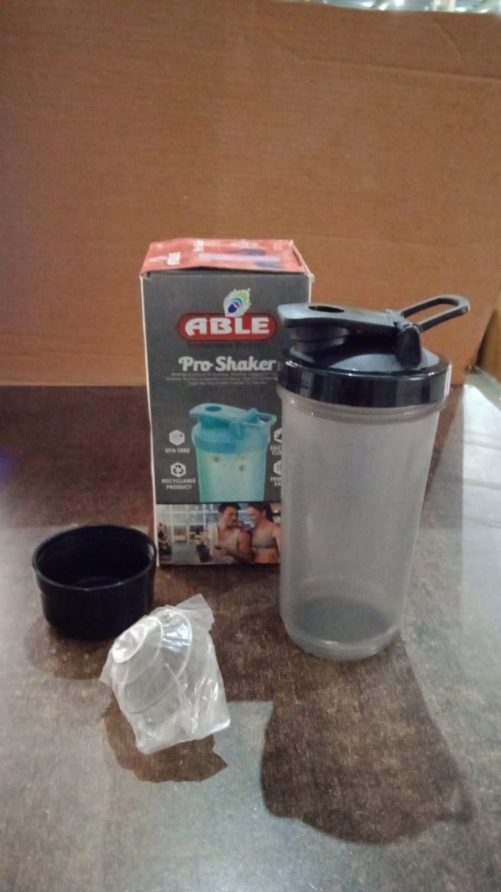 Gym Shaker Bottle shown in a fitness setting, ready for your workout.