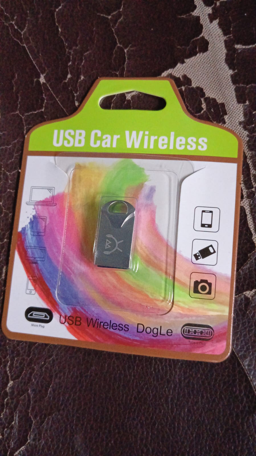 The USB Car Bluetooth Adapter shown from an angle, emphasizing its portable form factor.