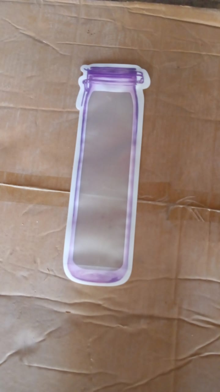 Three bottle-shaped reusable food storage bags displayed together.