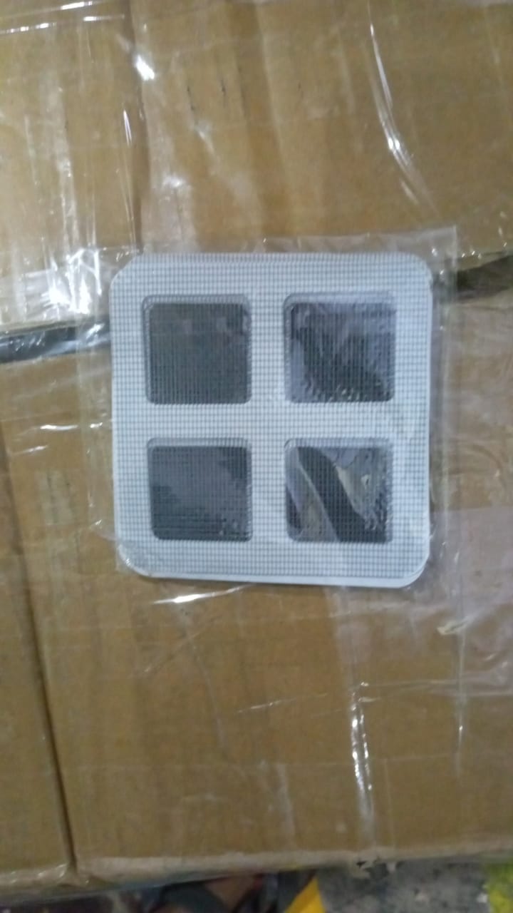 Demonstration of the repair kit fixing a torn mosquito net, restoring its integrity quickly.