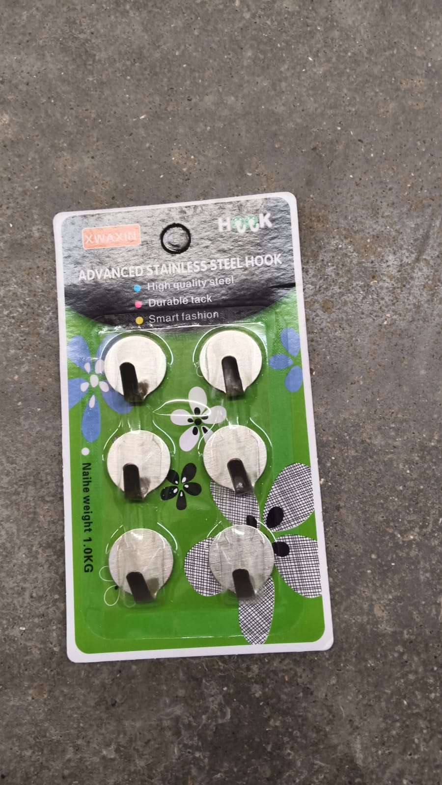 Self adhesive wall hooks displayed on interior wall