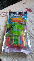 A stack of 111 multi-color Holi water balloons packaging.