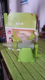 Angled view of manual juicer on white background