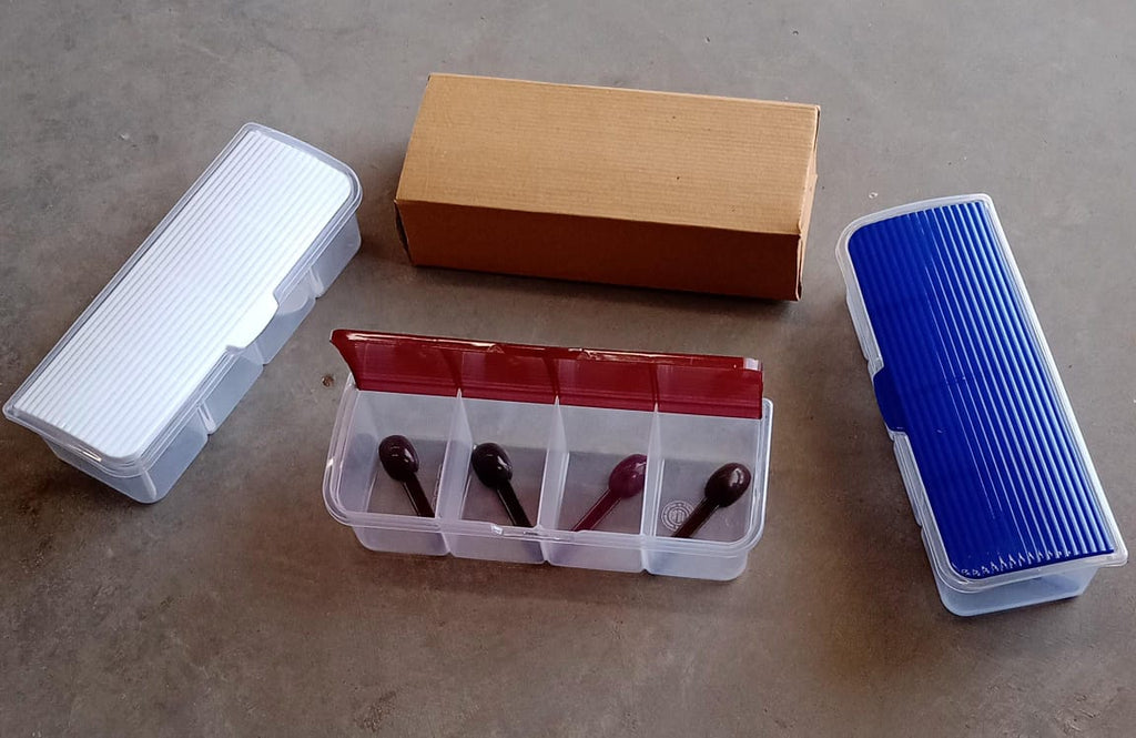 Multipurpose storage box holding dry fruits, spices, and pickles.