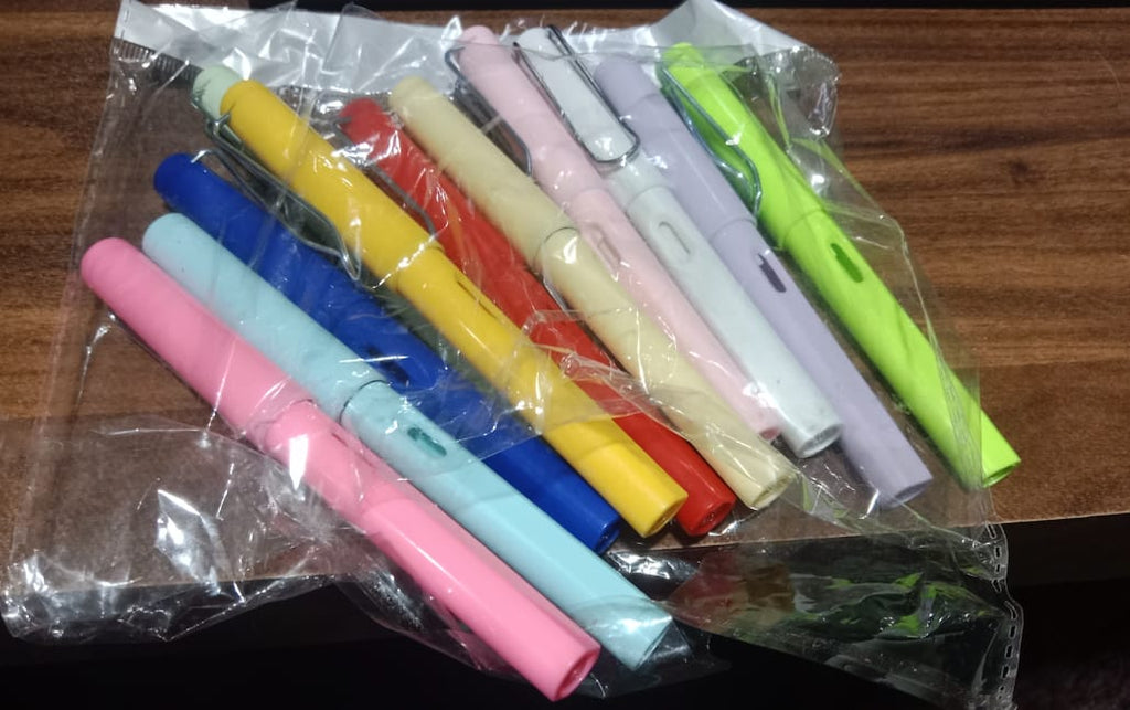 Everlasting magic pencil displayed with writing samples and accessories